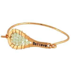"Believe" Bracelet in Worn Gold-tone with Light Green Beads